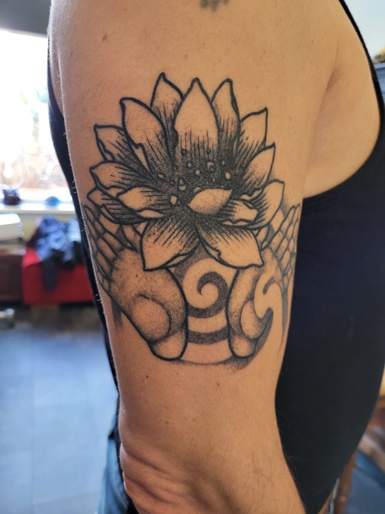 lotus arm tattoo