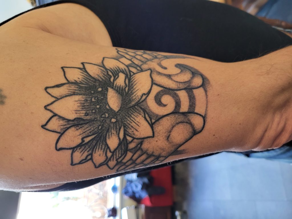 lotus arm tattoo
