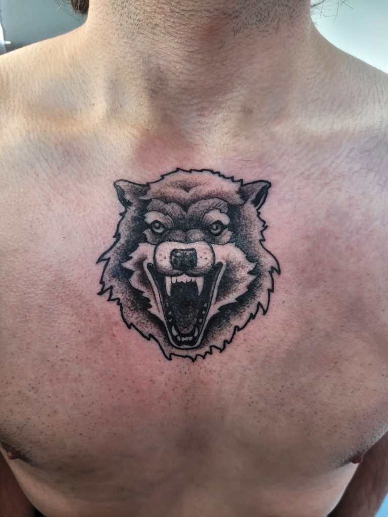 wolf chest tattoo